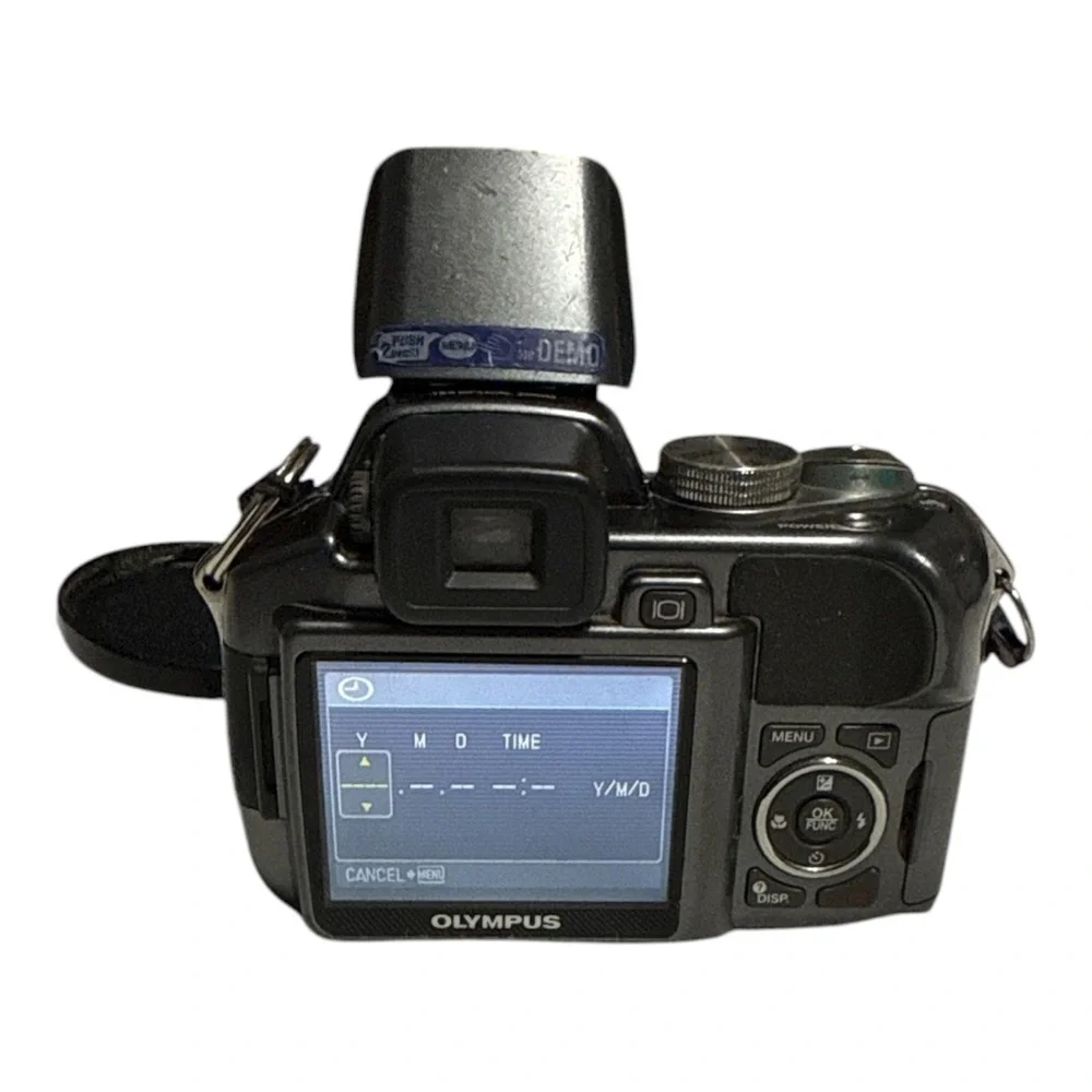 Olympus Black Digital Camera with Lens and Strap